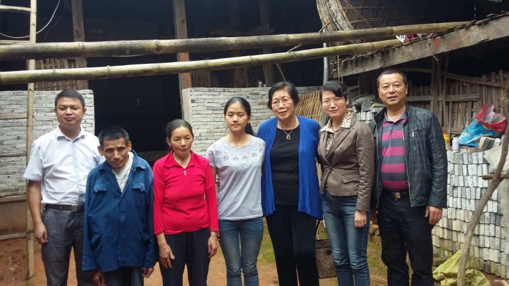 Betty Chou Visiting Financial Aid Recipient's Family