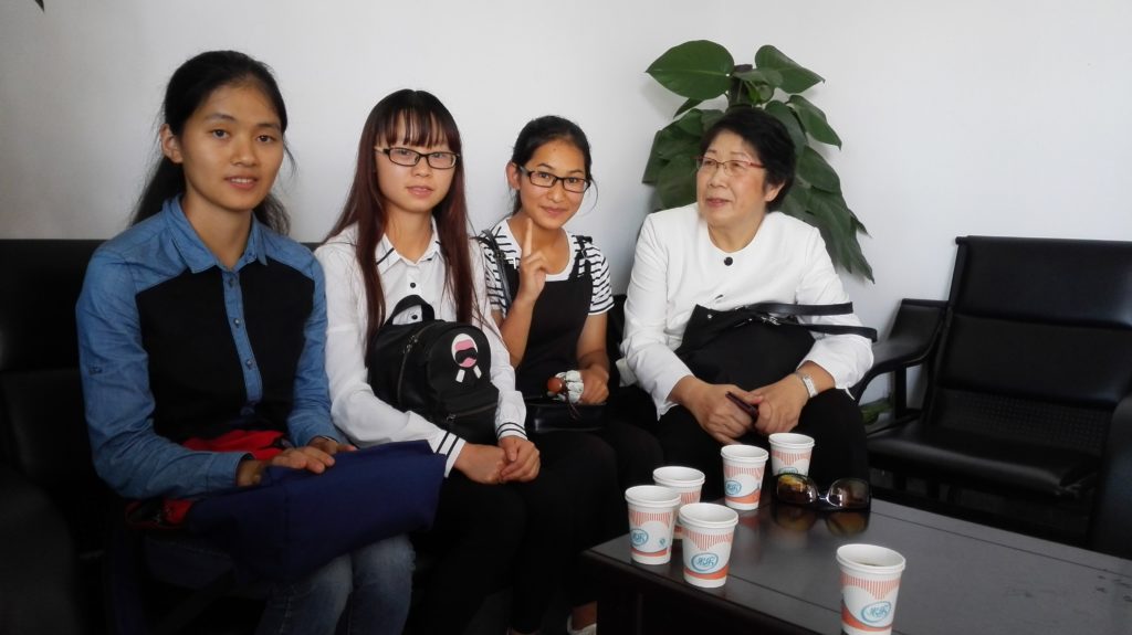 Three Financial Aid Recipients and Betty Chou